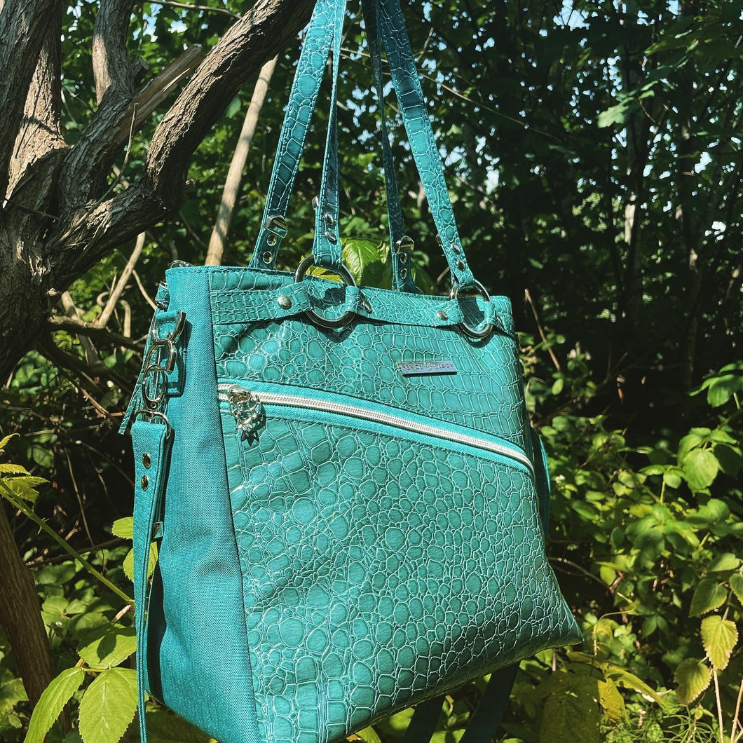 Teal crossbody bag with faux croc and waterproof canvas